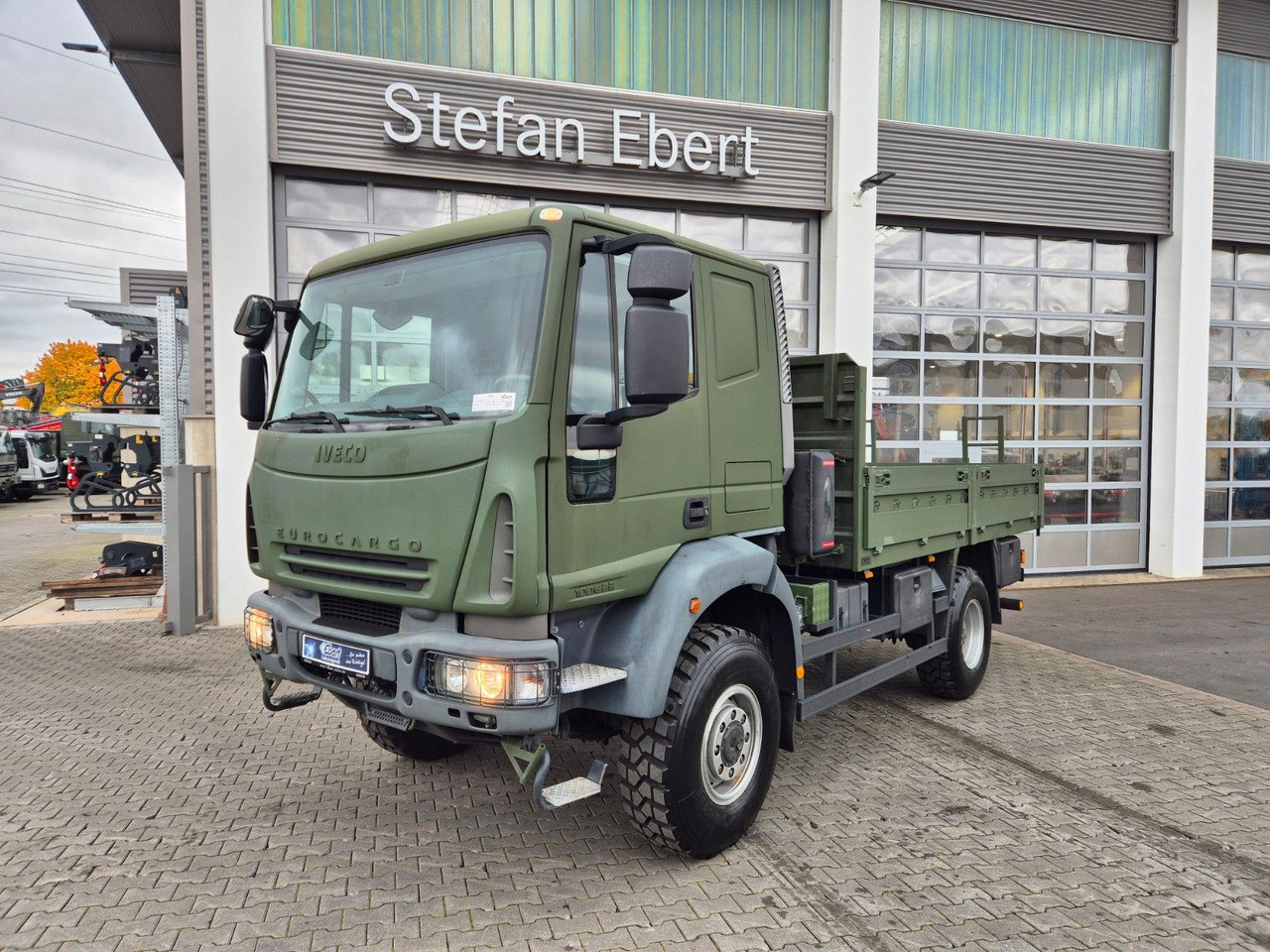 Iveco Eurocargo ML100E22WM-BW 4x4 Pritsche L-Haus Bett - Kamion sa tovarnim sandukom: slika 1 Iveco Eurocargo ML100E22WM-BW 4x4 Pritsche L-Haus Bett - Kamion sa tovarnim sandukom: slika 1