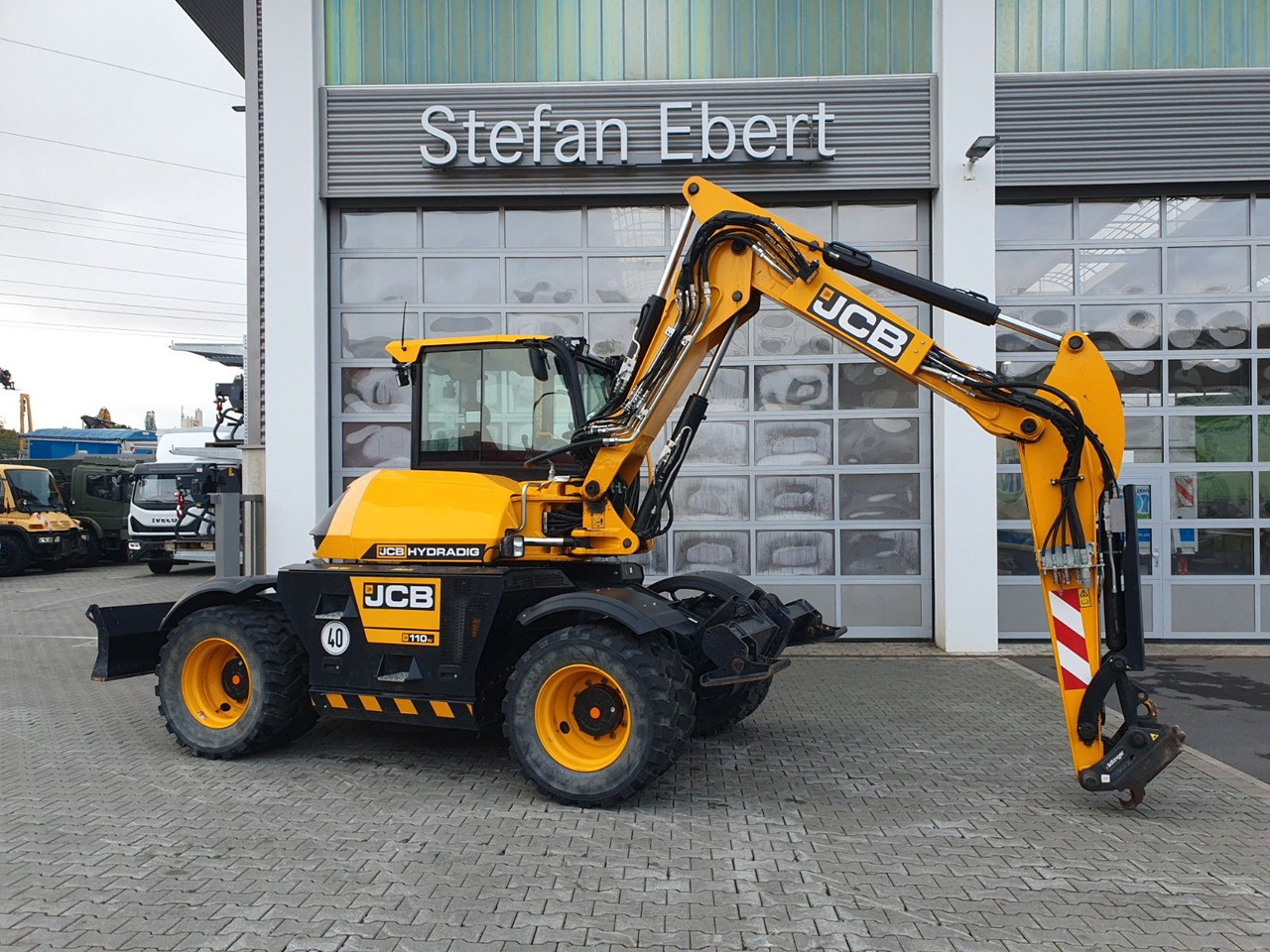 JCB Hydradig 110W / Pratzen / nur 572h! / 2023 - Bager točkaš: slika 1 JCB Hydradig 110W / Pratzen / nur 572h! / 2023 - Bager točkaš: slika 1