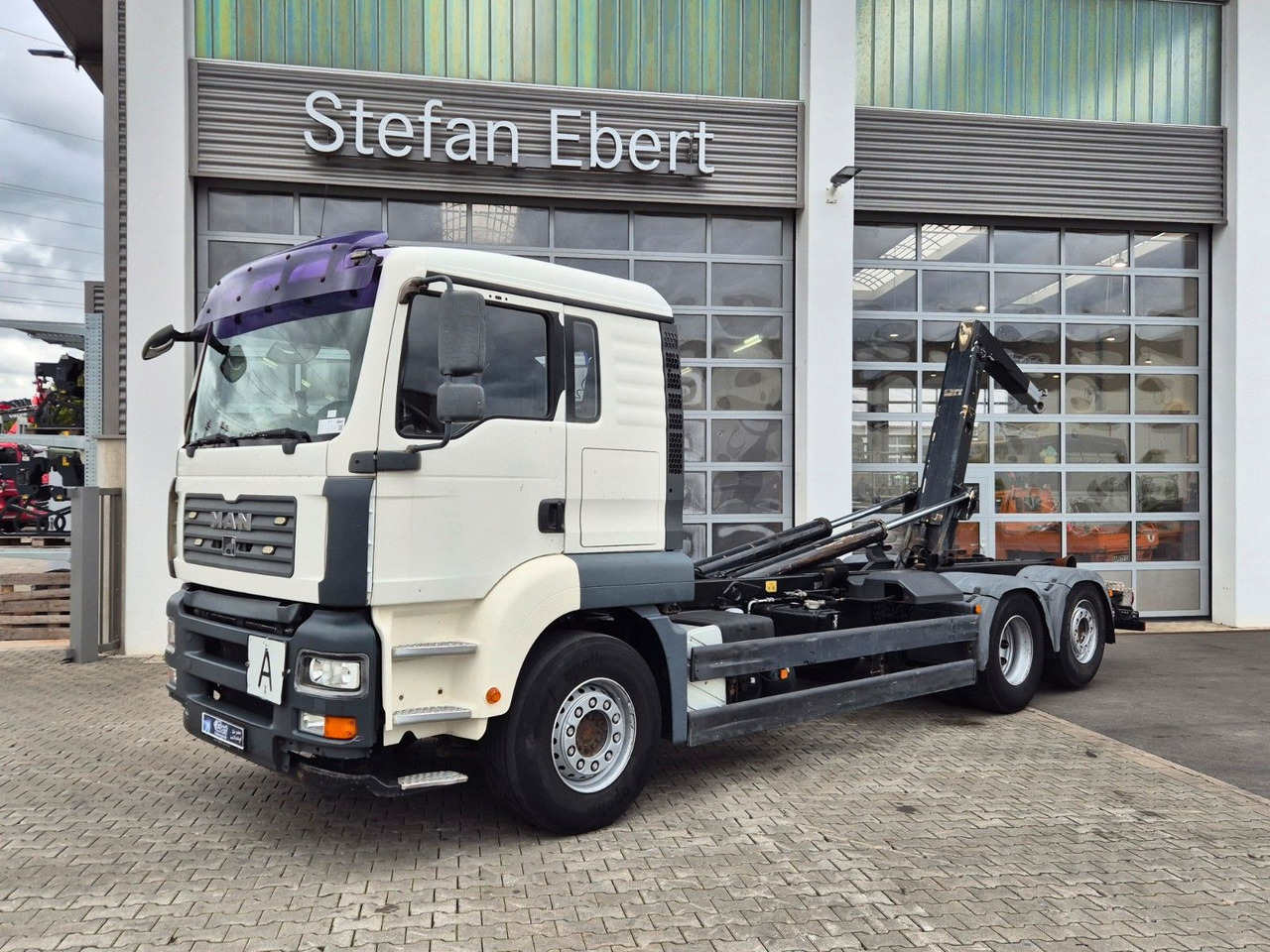 MAN TGA 26.440 6x2-2 BL Meiller RK 20.70 Bett - Kamion sa hidrauličnom kukom: slika 1 MAN TGA 26.440 6x2-2 BL Meiller RK 20.70 Bett - Kamion sa hidrauličnom kukom: slika 1