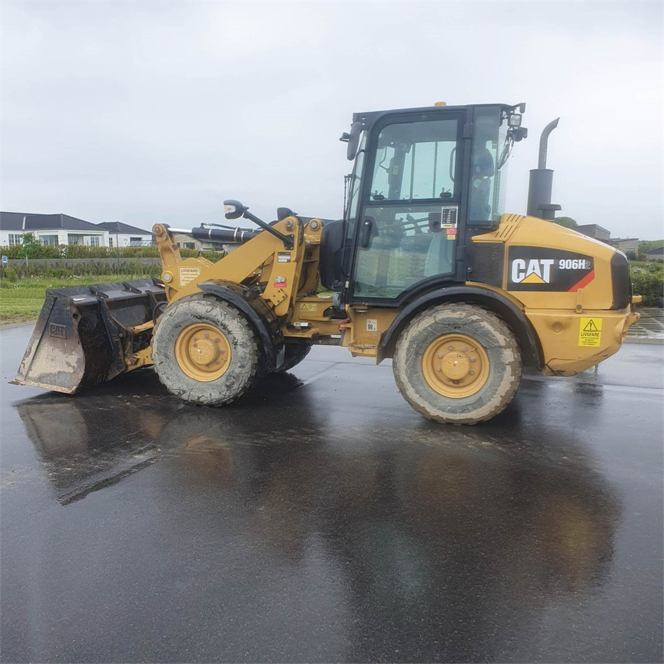 Caterpillar 906 H2 - Utovarivač točkaš: slika 1 Caterpillar 906 H2 - Utovarivač točkaš: slika 1