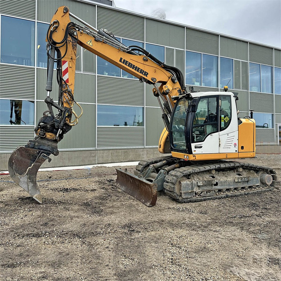 Liebherr R914 Compact Litronic - Mini bager: slika 1 Liebherr R914 Compact Litronic - Mini bager: slika 1