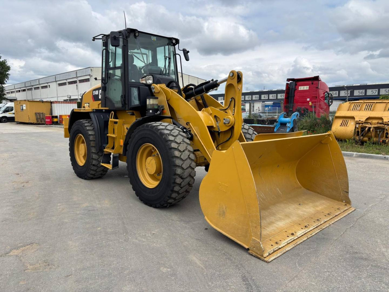 CAT 914M - Utovarivač točkaš: slika 1 CAT 914M - Utovarivač točkaš: slika 1
