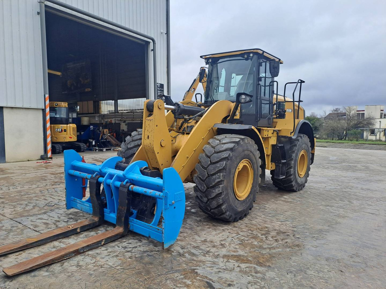 CAT 950M - Utovarivač točkaš: slika 1 CAT 950M - Utovarivač točkaš: slika 1