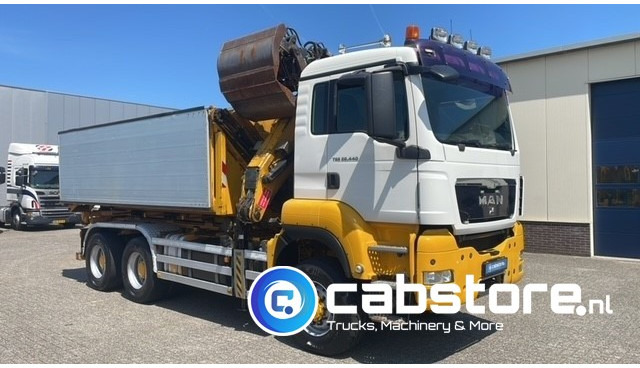 MAN TGS 26.440 6X6 BB EEV MAN TGS 26.440 Euro 5 EEV - 6X6 - Laadkraan - Kipper - Kabelsysteem - Bouwjaar 2010 - Km 657.509 - APK tot 22-11-2025 !! - Istovarivač, Kamion sa dizalicom: slika 1 MAN TGS 26.440 6X6 BB EEV MAN TGS 26.440 Euro 5 EEV - 6X6 - Laadkraan - Kipper - Kabelsysteem - Bouwjaar 2010 - Km 657.509 - APK tot 22-11-2025 !! - Istovarivač, Kamion sa dizalicom: slika 1