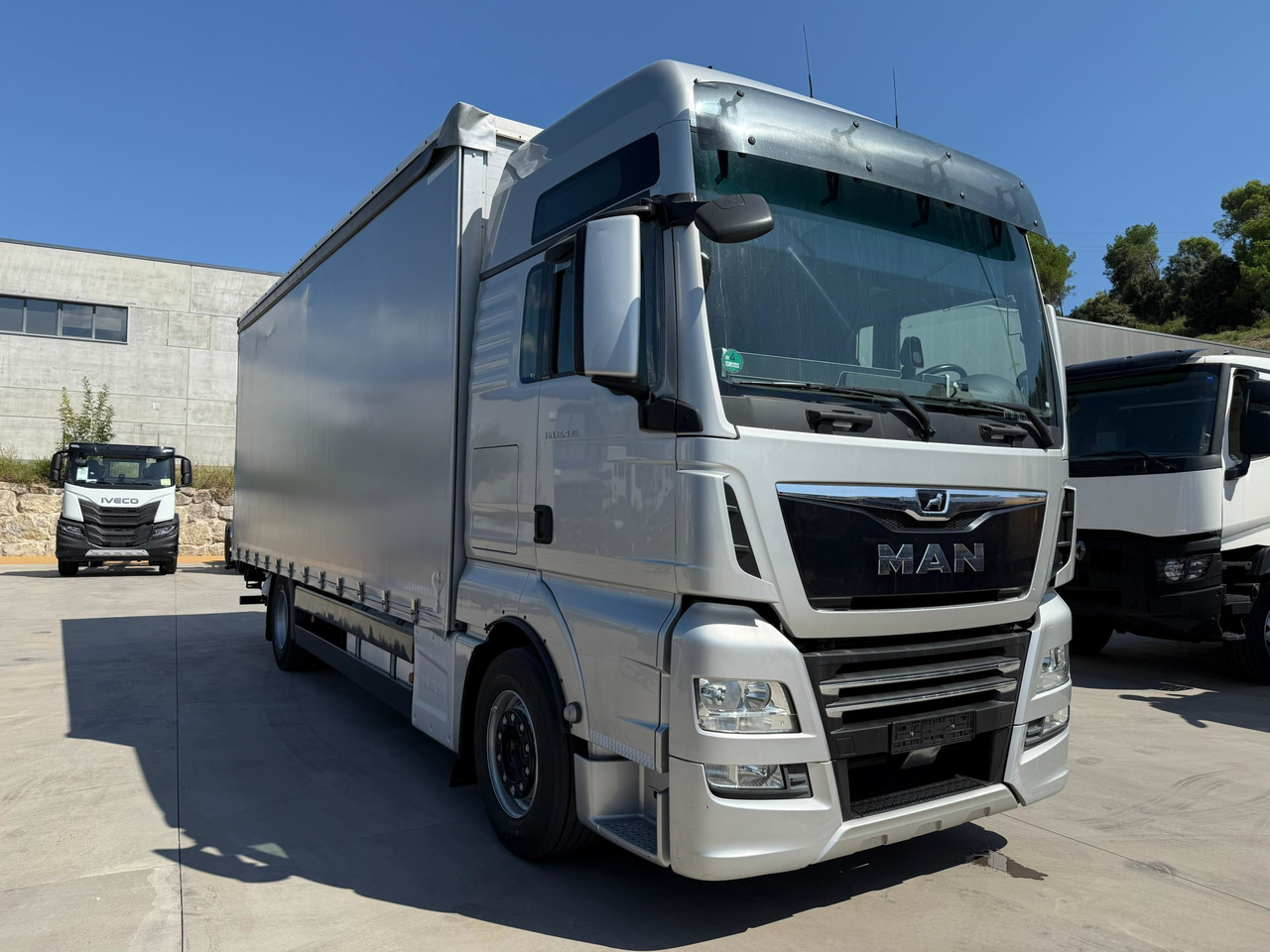MAN 18.430 LL TGX E6 (Tauliner) - Kamion sa ceradom: slika 2 MAN 18.430 LL TGX E6 (Tauliner) - Kamion sa ceradom: slika 2