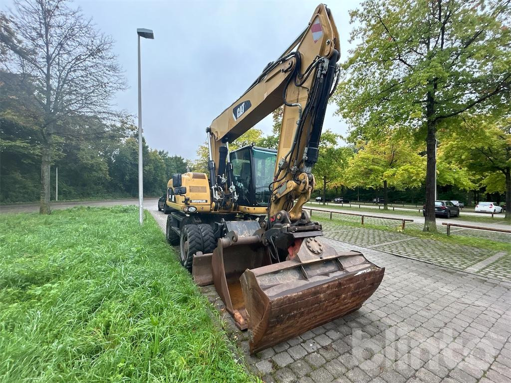 CAT M 318D - Bager točkaš: slika 2 CAT M 318D - Bager točkaš: slika 2