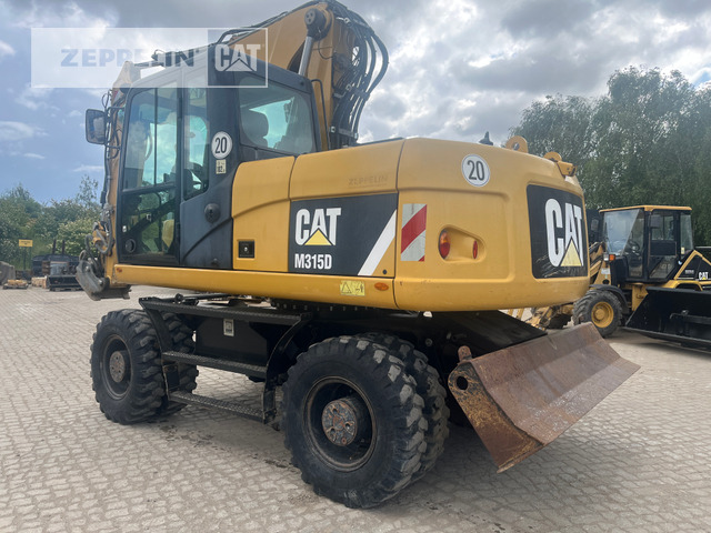 Cat M315D - Bager točkaš: slika 1 Cat M315D - Bager točkaš: slika 1