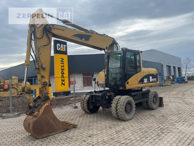 Cat M316C - Bager točkaš: slika 1 Cat M316C - Bager točkaš: slika 1